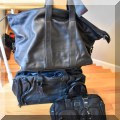 H05. Tumi bags. 